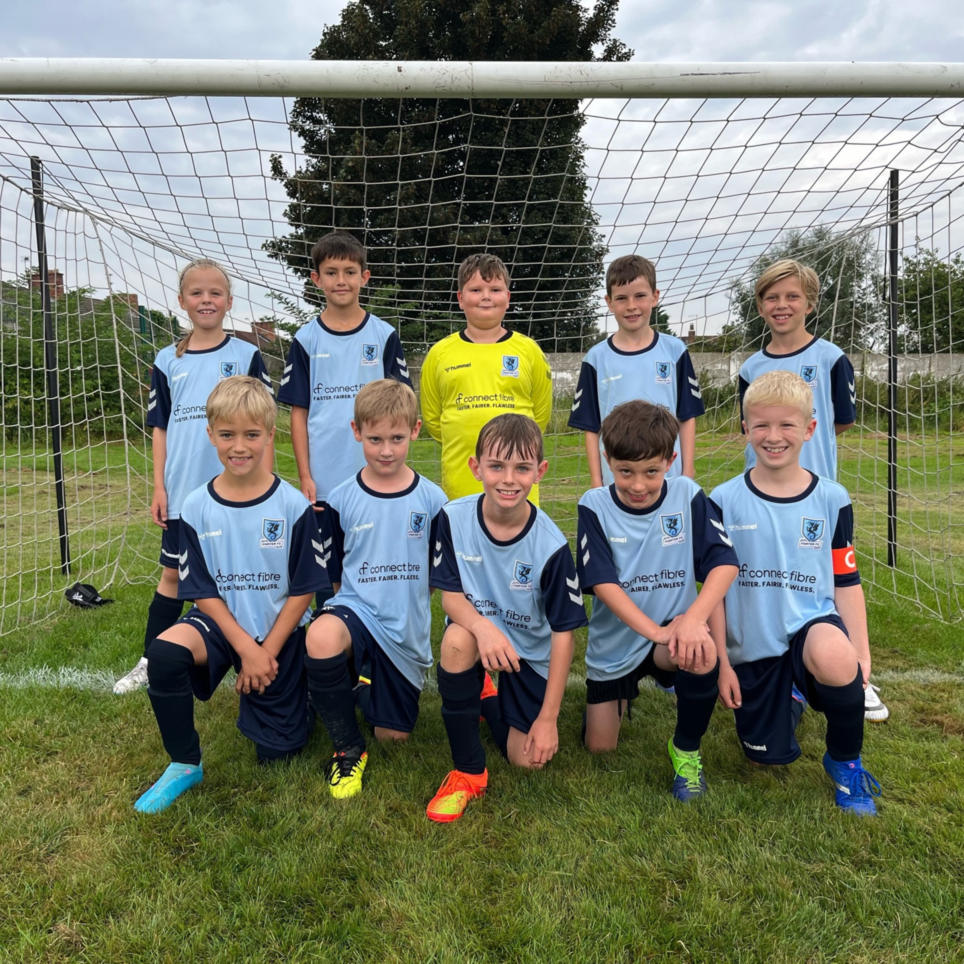 Porter Football Club Team Photo in front of a football goal