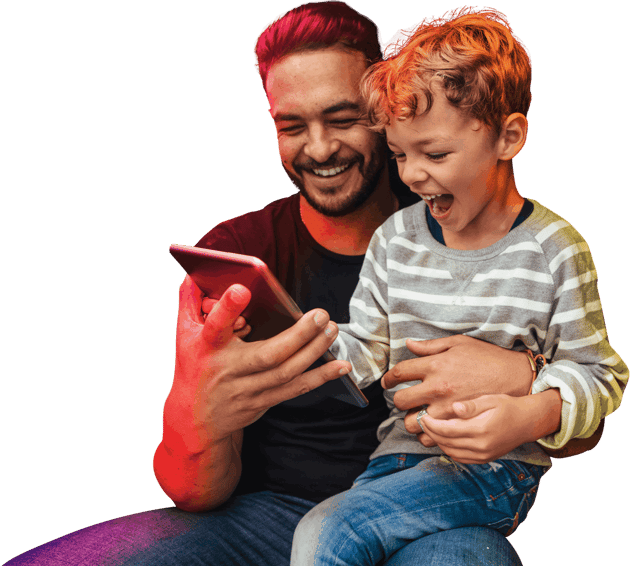 Father and young child enjoying full fibre broadband on a tablet