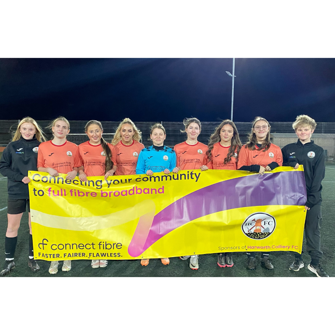 Harworth Colliery Football Club standing with a Connect Fibre banner