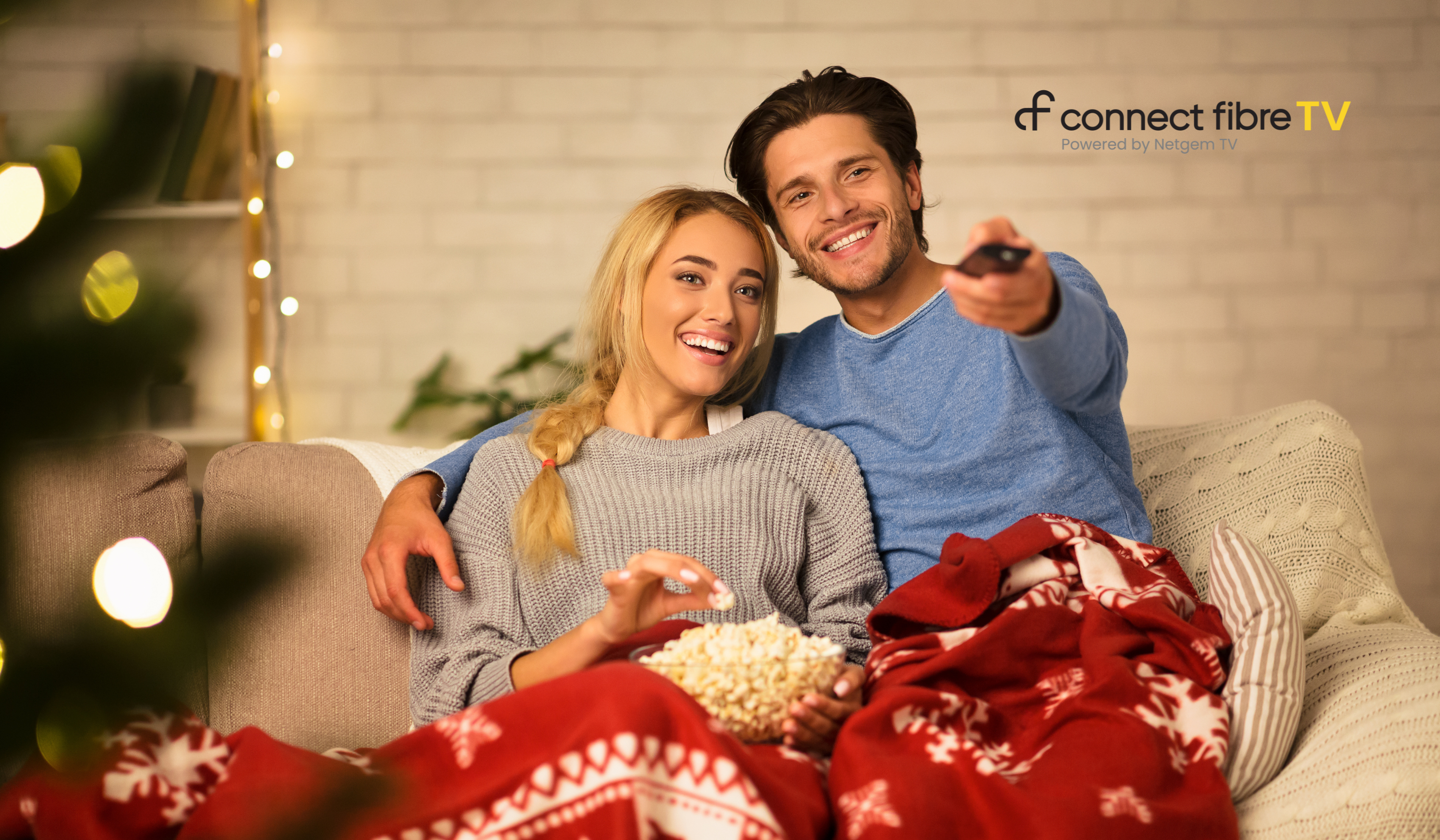 Couple watching Christmas Film